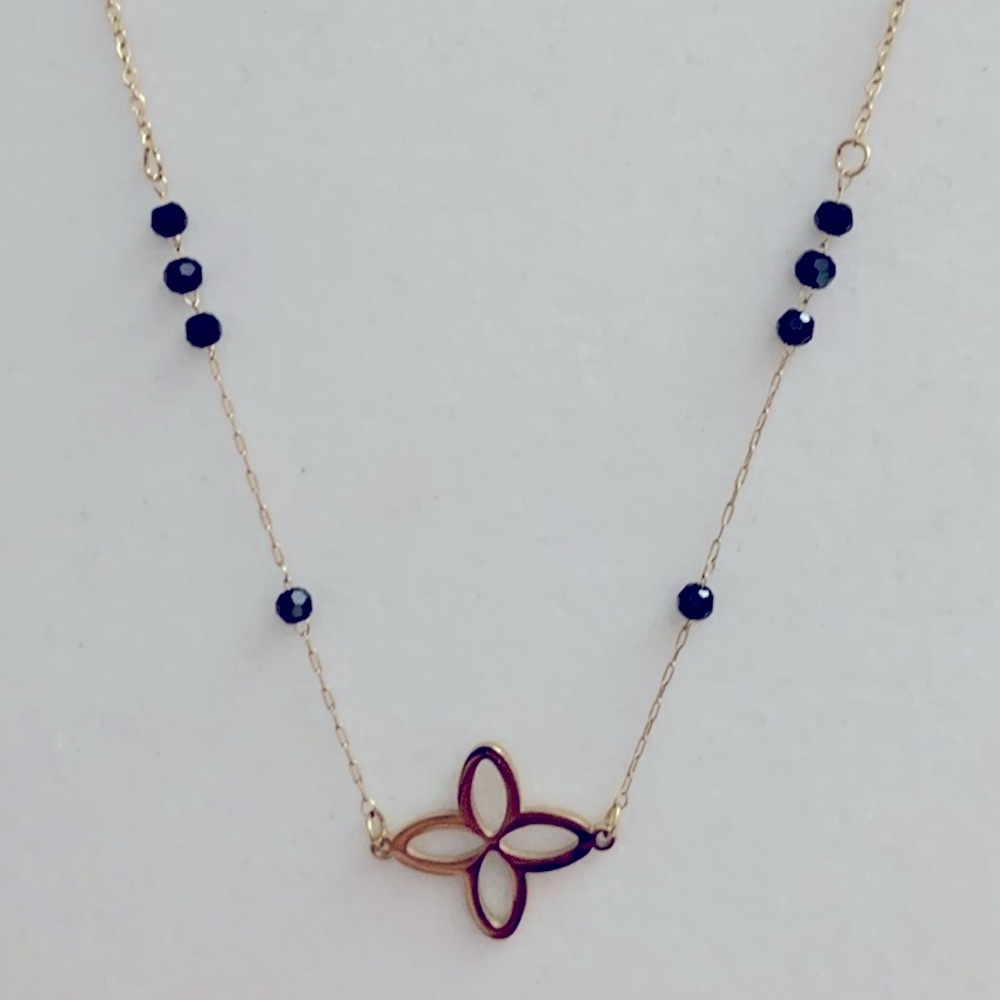 Stainless steel Necklace with Floral Detail and Black Beads.